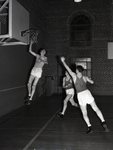 Men playing basketball by H. Glenn Hogue and Central Washington University